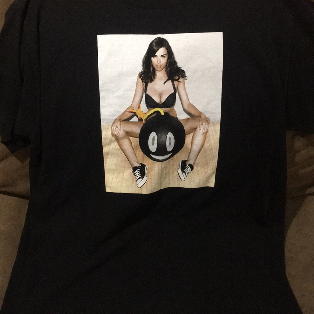 Black T with girl and the hundreds bomb logo